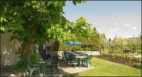 image of our patio on a sunny afternoon. A perfect place to rela and rewind